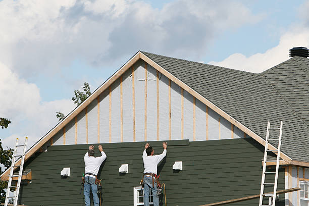 Professional Siding Installation technician working in White Marsh, MD